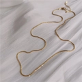 Elegante goldfarbene geflochtene Titanstahlkette mit detaillierter Webstruktur für Damen - Halskette / Gold