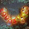 Ghirlanda LED natalizia con Babbo Natale e pupazzo di neve a luce gialla calda - Stile Mix di Natale D / 1,5m 10-LED Alimentato a Batteria