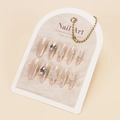 Detailed view of handmade coffin press-on nails with 3D white roses and sparkling rhinestones - By1653 / Glue Type