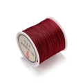 Close-up of 0.8mm dark red braided nylon cord spool for DIY jewelry making and knots - Burgundy