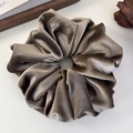 Detailed view of the oversized gray velvet scrunchie showing plush texture and elastic band - Grey Coffee