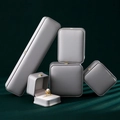 Elegant grey leather jewelry gift box set including necklace, pendant and ring holders - Crown Standard Ring Box / Gray