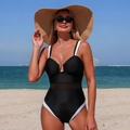 Detail of black one-piece swimsuit featuring white contrast straps and mesh waist panel - S / Black