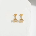 Macro shot of gold fan-shaped stud earrings with green stones and clear zircon accents - Triangle/Fan Shape