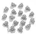 Close-up of small stainless steel three-ball charms with precise 8.5mm size markings - Cartoon Avatar / Silver