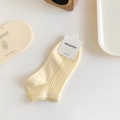 Pale yellow ribbed cotton ankle socks for women featuring minimalist aesthetic styling - One Size / Light Yellow
