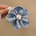 Elegant blue silk flower hair claw clip with large faux pearl center and acrylic grip - Blue Fabric Flower Claw Clip
