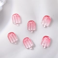 Detailansicht von sechs rosa transparenten Glitzer-Harz-Eiscreme-Nagelkunst-Anhängern - 6er Set / Kirschblütenrosa