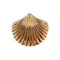 Detail of a golden seashell hair accessory with radiant textures and a metallic finish - Shell Spring Clip (Scallop Shaped Gold Clip)