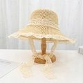 Beige woven straw sun hat featuring elegant white lace trim and long lace ribbon ties - Machine Lace Beige