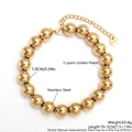 Detailed view of 10mm gold plated stainless steel bead bracelet with lobster clasp - 10mm / Gold