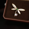 Golden dragonfly brooch with white mother-of-pearl wings and green gemstone accent - 357# Dragonfly