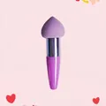 Detail view of a purple heart-shaped sponge makeup brush with a sleek metallic silver ferrule - Single Pack / Purple Tube + Dark Purple Teardrop Head