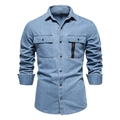 Dettaglio camicia di jeans blu scuro con doppie tasche sul petto e cerniera decorativa - S / Azzurro