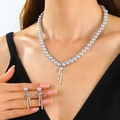 Parure de collier et boucles d'oreilles en perles grises avec nœuds argentés - Ensemble Perles Artificielles Grises et Noeud (1069)