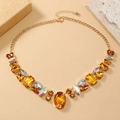 Collana vintage dorata con cristalli gialli, ambra e iridescenti per eventi eleganti - Oro Champagne KC