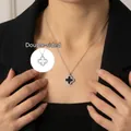 Collier trèfle à quatre feuilles réversible avec incrustations noir et blanc élégant - Collier Trèfle Argenté (Double Face)
