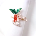 Gold napkin ring featuring a silver metal rabbit holding an orange enamel carrot detail - 2-Silver Textured Bunny Holding Orange Carrot