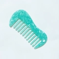 Close-up of wide-tooth marble acetate comb in turquoise green with smooth texture - Sky Blue