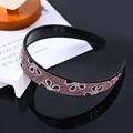 Sparkling pink rhinestone headband with circular crystal patterns on black band - Three-Leaf Purple
