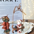 Christmas resin set with Santa on sleigh and red bells on a gold-rimmed mirror - Santa on Sleigh