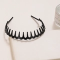 Cerchietto in acetato nero ondulato con denti antiscivolo per donna su supporto elegante - Nero