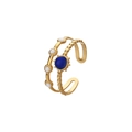 Adjustable gold stainless steel double ring featuring a blue sunburst charm and white accents - Gold Double Ring Blue Heart Sun (J516-1)