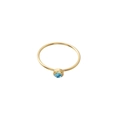 Detail of minimalist gold ring featuring a bezel-set round blue birthstone on white background - US Size 7 / Gold-Deep Blue (Dec)