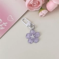 Romantischer lila Kirschblüten-Schlüsselanhänger mit matter Harzoberfläche und weißem Verschluss - Gelee Violett