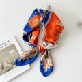 Silk-like square scarf with orange blue baroque chain print tied in an elegant knot - Blue Gold Chain Emblem