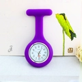 Detail of purple silicone nurse fob watch with luminous hands and a white dial - Purple