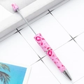 Pink DIY beadable pen with red ribbon and heart patterns on a white background - Pink Ribbon and Heart (93)