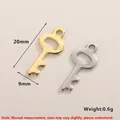 Colgantes de llave minimalistas en acero inoxidable dorado y plateado de 20mm x 9mm - Accesorio de Colgante de Llave (Color Acero)
