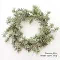 45cm Christmas pine needle wreath with snowy finish and pine cones, 280g weight - 45cm Wreath / 280g