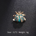 Exquisite golden ladybug brooch with blue gemstone and sparkling rhinestones - Blue Rhinestone Ladybug