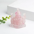 Roze doorschijnend kristallen kasteelornament met glinsterende lovertjes voor bureau decor - Rozenkwarts