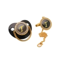 Detail of black and gold baby pacifier with rhinestone letter T and matching clip chain - Letter T