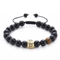 Macro shot of black agate beads with tiger eye stone and gold zircon letter P charm - Letter P-Black Agate Bracelet