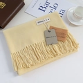 Solid light yellow cashmere-feel scarf with elegant fringes and branded tags - Milky Yellow / 200cm