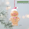 Gingerbread man Christmas metal hanging ornament with red hat and dimensions 10.5x5.5cm - Gingerbread Man