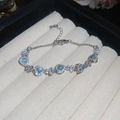 Elegant silver bracelet with light blue heart stones and zircon floral connectors - 2# Silver Blue Heart Style