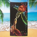 Microfiber beach towel with colorful sea turtles hanging by the ocean and palm trees - Sea Turtle Beach Towel 1