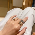 Set of chunky minimalist metal rings in gold and silver finish on hand - Minimalist Organic Chunky Gold Silver Ring