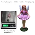 Flower fairy resin ornament in purple dress with dimensions 4x3.7x8cm and light wings - Fairy Lifting Skirt