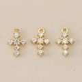 Macro detail of 18K gold plated Baroque cross pendants with sparkling crystal inlay - Beige Polka Dot / 0.9*0.6cm / Gold