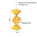 Golden candy-shaped Christmas tree ornament with glitter PVC finish and hanging string - Electroplated Gold Dice Candy