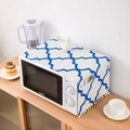 Detail of linen microwave cover with blue Moroccan pattern and side storage pocket - Microwave Style / Blue Rhombus