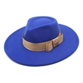 Close-up of royal blue wool fedora hat featuring a brown ribbon and metal bee ornament - Blue