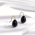Minimalist black teardrop earrings with elegant golden hooks on a wave display - Black Water Drop Hook Earrings ER-745