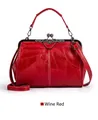 Retro wine red cross-body handbag with textured oil leather and metal frame closure - Burgundy